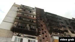 Сожженная многоэтажка в Херсоне