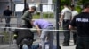 Momentul arestării suspectului în cazul atentatului asupra premierului slovac.