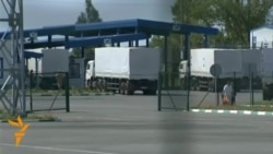 Russian Truck Convoy Begins Crossing Into Ukraine