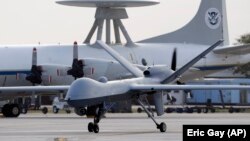 A Predator B unmanned aircraft taxis at the Naval Air Station in Corpus Christi, Texas. 