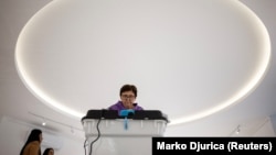 A woman casts her ballot during Bosnia and Herzegovina's 2026 general election, in Banja Luka, Bosnia and Herzegovina, October 4, 2026.
