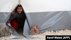 Cириянын Чыгыш Гута аймагынан эвакуацияланган балдар, 22-апрель, 2018-жыл.
