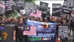 Протесты перед посольствами России и Украины в Малайзии
