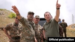 Armenia -- Defense Minister Davit Tonoyan (R) inspects Armenian army positions on the border with Azerbaijan, July 21, 2018.