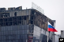 Торговий центр, де стався напад, вибухи і пожежа. Підмосков’я, Росія. 23 березня 2024 року