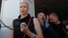 Maryya Kalesnikava addresses participants during a demonstration to protest the election result in Minsk in August 17