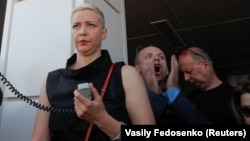 Maryya Kalesnikava addresses participants during a demonstration to protest the election result in Minsk in August 17