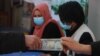 یونیسف برای نیازمندان در نورستان کمک‌های نقدی توزیع می‌کند