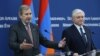 Armenia - Johannes Hahn (L), the EU commissioner for European neighborhood policy, speaks at a joint news conference with Armenian Foreign Minister Edward Nalbandian in Yerevan, 2Oct2017.