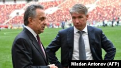 Russian Deputy Prime Minister Vitaly Mutko (left) and Aleksei Sorokin talk after the FIFA World Cup Trophy Tour opening ceremony at Luzhniki Stadium in Moscow in September.