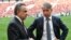 Russian Deputy Prime Minister Vitaly Mutko (left) and Aleksei Sorokin talk after the FIFA World Cup Trophy Tour opening ceremony at Luzhniki Stadium in Moscow in September.