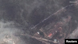 A satellite image shows a long traffic jam of vehicles along the Lachin corridor as ethnic Armenians flee from Nagorno-Karabakh.