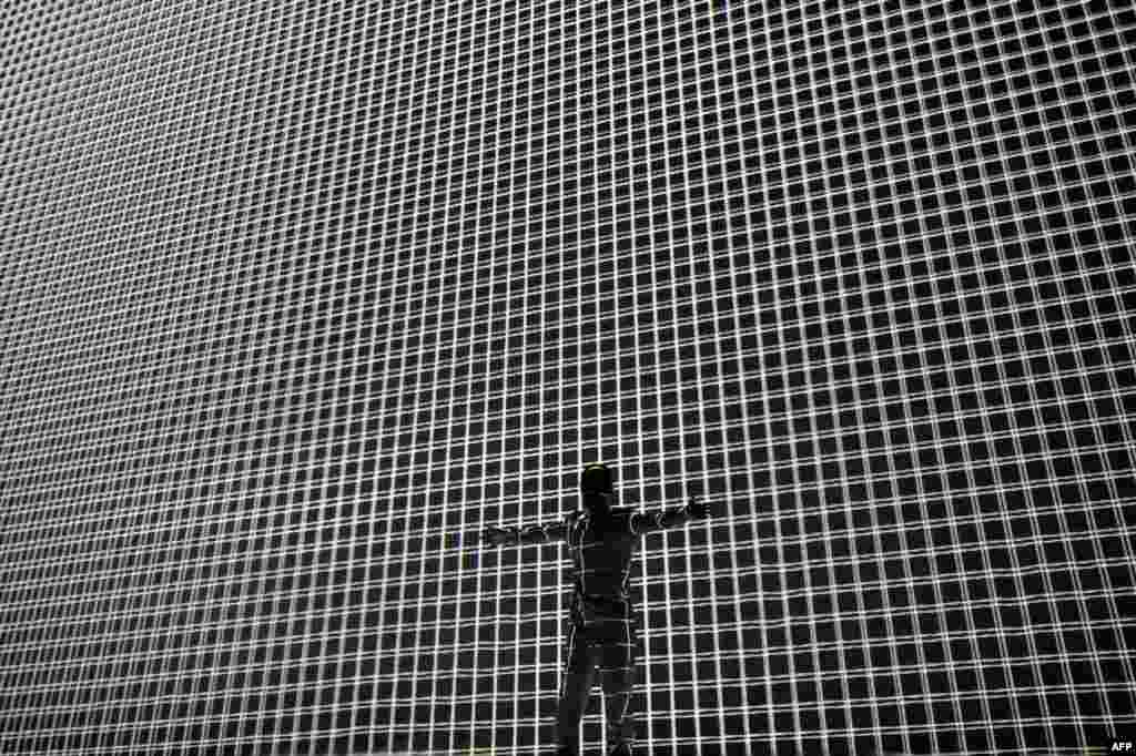 OCTOBER 6, 2012 -- Japanese dancer and choreographer Hiroaki Umeda rehearses for his upcoming show &quot;Adapting For Distortion&quot; at the Sofia Dance Week festival in the Bulgarian capital. (AFP/Dimitar Dilkoff)