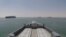 The British Royal Navy destroyer HMS Duncan passes through the Suez Canal into the Persian Gulf on July 28.