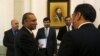 Ahmad Chaudhry, head of Pakistani delegations, (L) talks with Afghan Foreign Minister Salahuddin Rabbani before a meeting in Kabul on February 23.