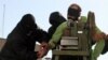 A burglar's fingers are cut off as a Qisas punishment in Tehran in 2017. Since 2015, such "eye-for-an-eye" punishments have been increasingly frequent, despite human rights groups saying the practice amounts to torture.