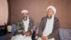 Ayman Al-Zawahiri (right) with Al-Qaeda leader Osama bin Laden in Afghanistan in 2001