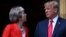 British Prime Minister Theresa May poses for a photograph with U.S. President Donald Trump at Chequers in the U.K.