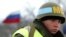 A Russian peacekeeper guards a checkpoint outside the South Ossetian capital of Tskhinvali