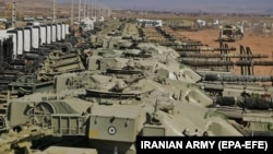 Iranian Army tanks line up during military exercises near the border with Azerbaijan that have drawn ire from Baku. 