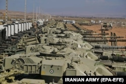 Iranian Army tanks are seen during the military exercise on October 1.