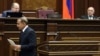 Armenia - Parliament speaker Hovik Abrahamian walks off the podium after announcing his resignation to fellow lawmakers, 14Nov2011.