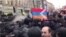 Azerbaijanis and Armenians scuffle over Nagorno-Karabakh in Moscow Victory Day commemoration.