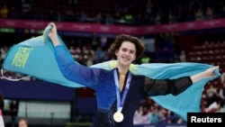 Михаил Шайдоров олимпиада чемпионы атанған сәт. Милан. 13 ақпан 2026 жыл.