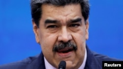 Звільнений у США бізнесмен Алекс Сааб був близьким союзником президента Венесуели Ніколаса Мадуро (на фото)
