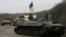 Українські військовослужбовці на бронетранспортері біля Артемівська. 3 березня 2015 року