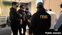Шектүүлөрдү кармоо учурунда тартылган сүрөт. 