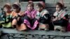 FILE: Kalash girls sitting outside their home in Kalash Valley, Chitral district in northwestern Pakistan's Khyber Pakhtunkhwa Province.