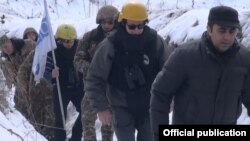 Armenian military officials escort OSCE observers during a regular ceasefire monitoring at the Armenian-Azerbaijani border, 16Feb2017.