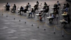 Pauza za ručak na određenoj fizičkoj distanci u Tokiju