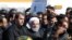 Iranian President Hassan Rohani (C) visits the earthquake-hit area of Sarpol-e Zahab in Iran's western province of Kermanshah, November 14, 2017