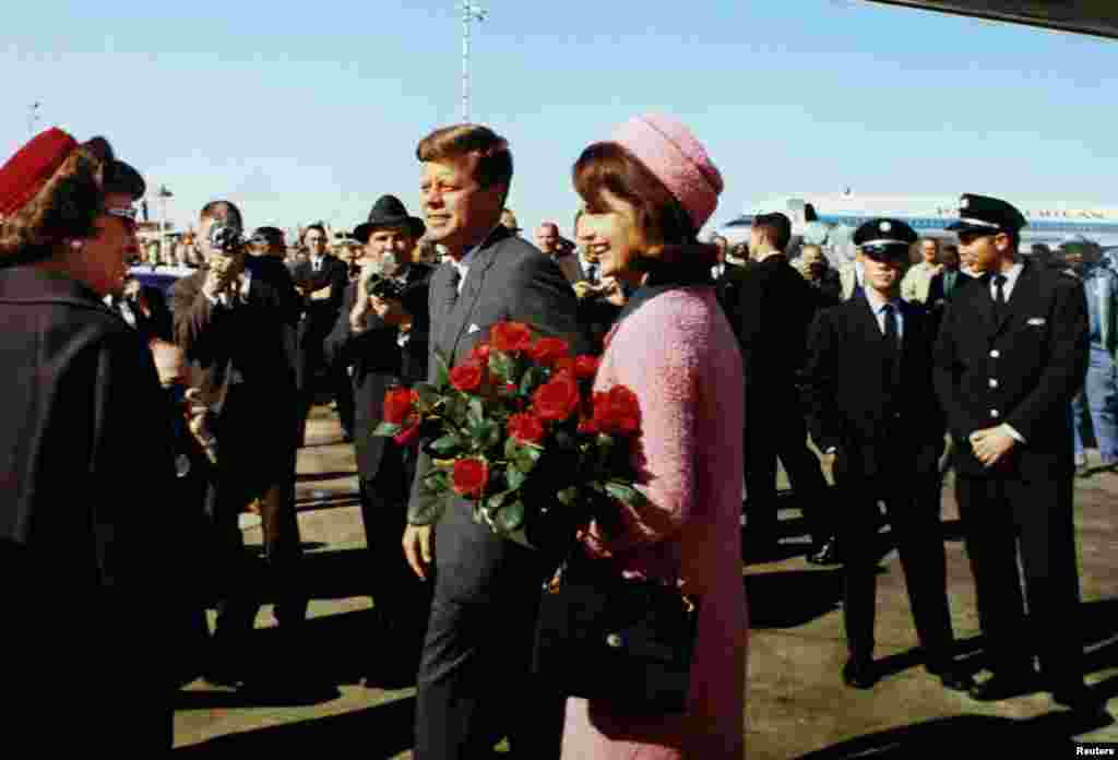 President John F. Kennedy and first lady Jacqueline Kennedy arrive at Love Field in Dallas, Texas less than an hour before his assassination.