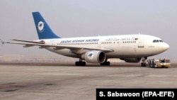 An Afghan Ariana Airlines aircraft sits at Kabul International Airport in Kabul. (file photo)