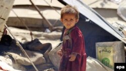 Большинство населения Земли — люди преимущественно устной культуры, — как, например, этот ребенок одного из афганских племен