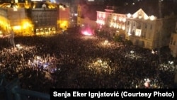 Supporters of the Students' List gather in central Belgrade to celebrate electoral victory in the parliamentary election.