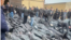A video grab taken on January 14 from UGC images posted on social media on January 13 shows dozens of bodies lying outside the Tehran Province Forensic Diagnostic and Laboratory Center in Kahrizak, as grieving relatives search for their loved ones.