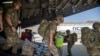 British soldiers disembark after landing in Kabul to assist in evacuating British nationals and entitled persons on August 15.