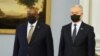 U.S. Defense Secretary Lloyd Austin (left) poses for photographers with Lithuanian President Gitanas Nauseda in Vilnius on February 19. 