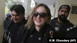 Tereza Hluskova leaves a court in Lahore on January 8.