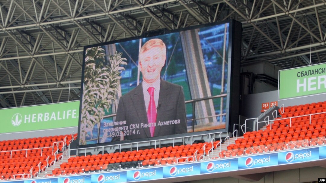 A speech by FC Shakhtar president Rinat Ahkhmetov is broadcast on a giant screen during a peace rally held at the Donbass Arena in the eastern Ukrainian city of Donetsk on May 20.