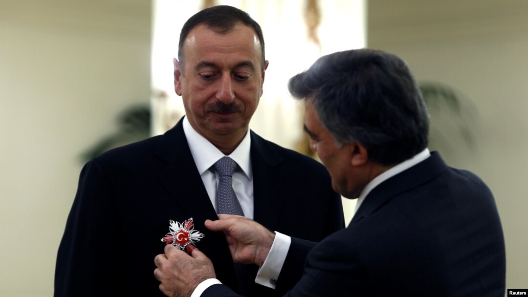 Azerbaijani President Ilham Aliyev received Turkey's State Honor Medal from Turkish President Abdullah Gul during a ceremony at the Presidential Palace in Ankara on November 12.