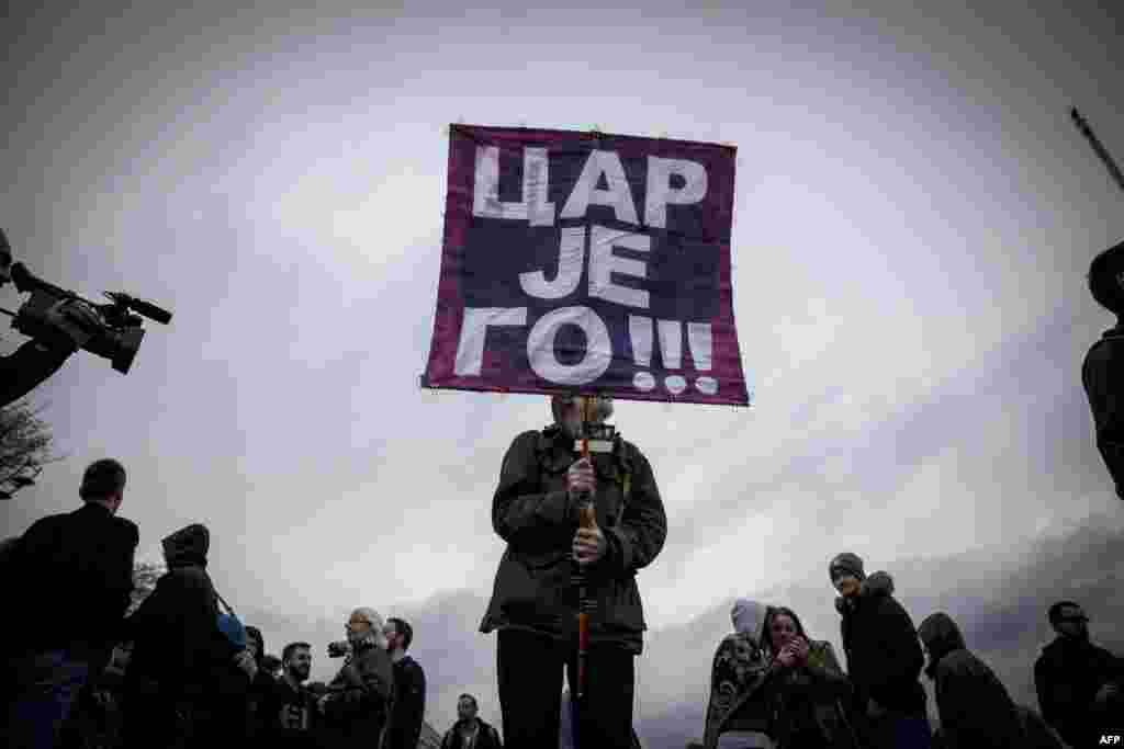 Demonstrators march during a protest against the presidential election victory of Serbian Prime Minister Aleksandar Vucic in Belgrade on April 18. (AFP/Oliver Bunic)