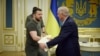 Ukraine's President Volodymyr Zelenskiy welcomes U.S. Senator Lindsey Graham (right) before their meeting in Kyiv on May 26.