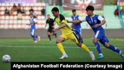 آرشیف، بازیکنان یک تیم فوتبال در افغانستان
