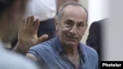 Armenia -- Former President Robert Kocharian waves to supporters during his trial, Yerevan, September 20, 2019.