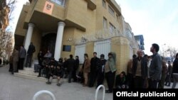Iranian waiting outside the Iraqi Consulate in Mashhad to obtain visas. Undated
